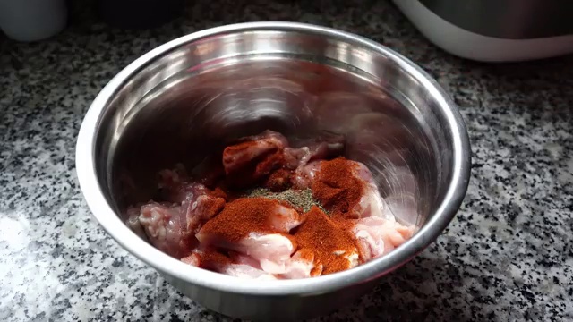 Coarsely chopped fresh garlic added to gently warmed cooking oil in a skillet