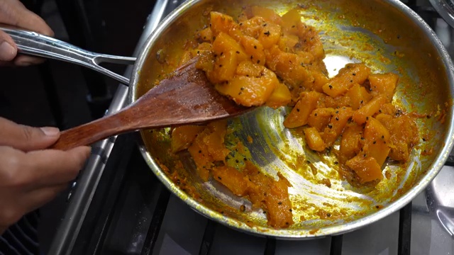 Sea salt and a pinch of sugar added to season the tender cooked pumpkin cubes