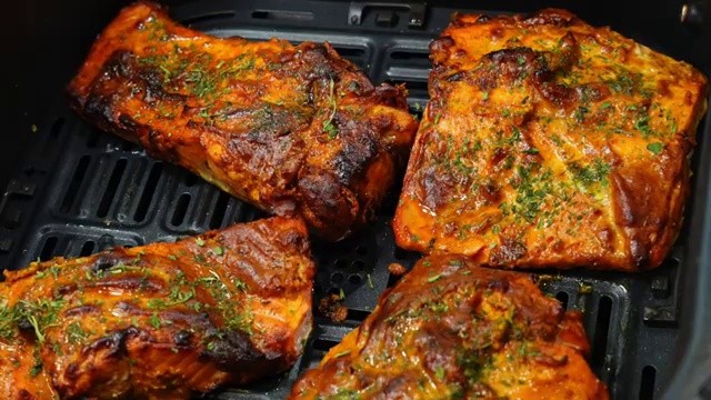 Air fryer tandoori fish served as a complete meal with steamed rice, fresh salad, and lemon