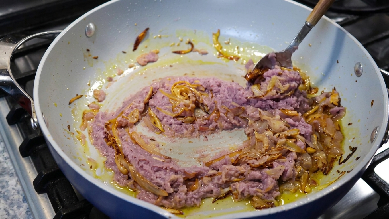 Rich Bengali curry gravy gently simmering and releasing aromatic spice oils