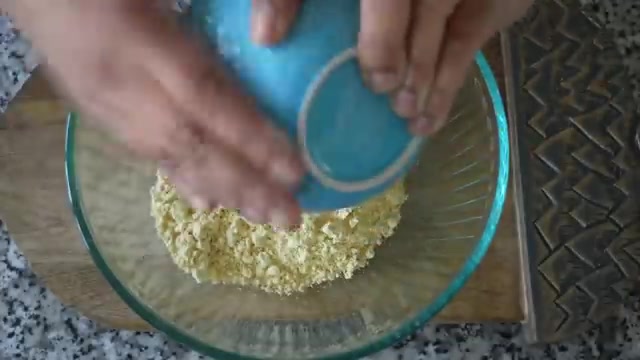 Besan, rice flour, yogurt, turmeric, ajwain, chopped onion, bell pepper, tomato, chilies, coriander, and spices arranged for making chilla