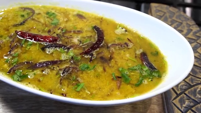Bowl of reheated Bengali masoor dal showing its rich and creamy texture