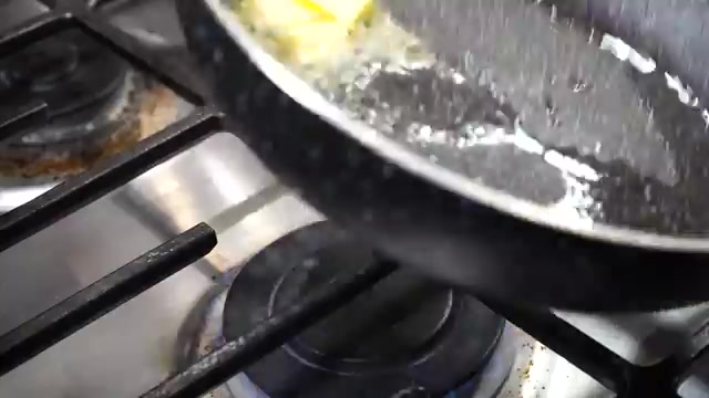 Butter melting with oil in a non-stick pan before adding moonglet batter
