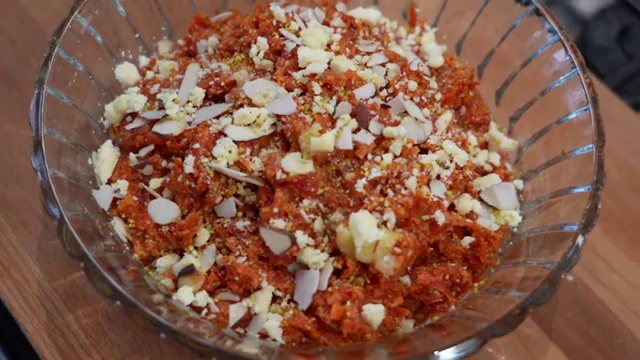 Carrot halwa portioned into freezer-safe containers for long-term storage