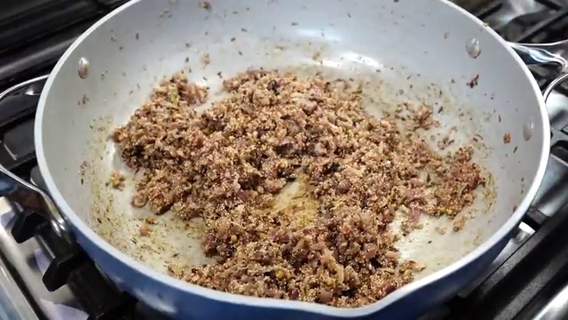 Chicken pieces lightly seared to a cream color in the pan to lock in natural juices