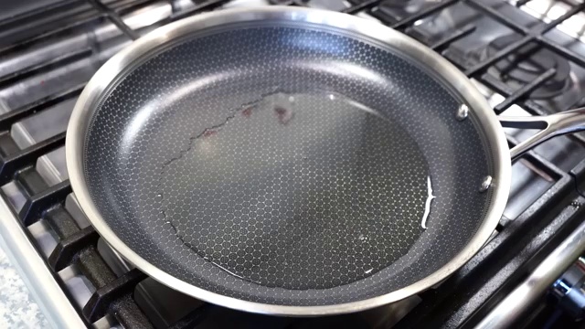 Chopped potatoes added to the skillet and stirred into the hot tempered spices