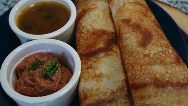 Complete South Indian-style dosa meal with crispy masala dosa, sambar, peanut tomato chutney, and potato filling