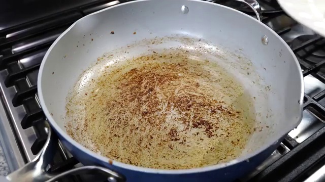Cooled roasted Xacuti masala mixture transferred to a blender jar with chili and turmeric