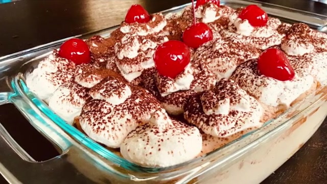 Covered coffee trifle pudding chilling in the refrigerator