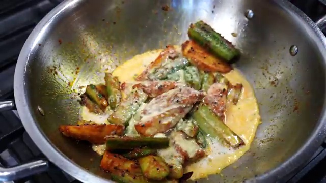 Covered skillet simmering gently over medium-low heat to tenderize vegetables