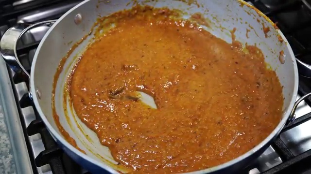 Skillet covered with a lid allowing the aromatic masala gravy to simmer gently on low heat
