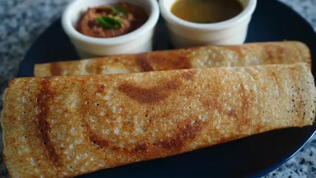 Crispy golden masala dosa made with ready-made dosa batter, folded around a potato filling and served with sambar and peanut tomato chutney