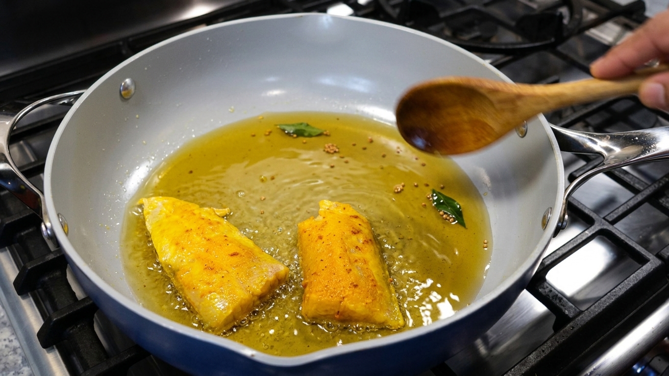 Whole cumin seeds crackling in hot oil alongside whole fragrant spices