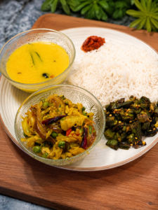 Daily Bengali Dal, Okra Sabji, and Cabbage Curry Indian Lunch Thali with Steamed Rice