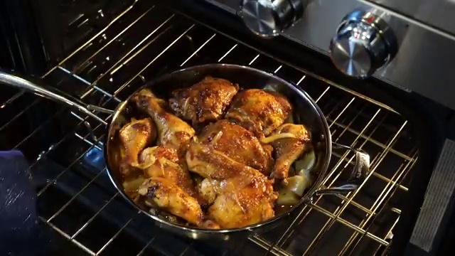 Finished golden-brown, crispy-skinned buttermilk chicken thighs and drumsticks in roasting tray
