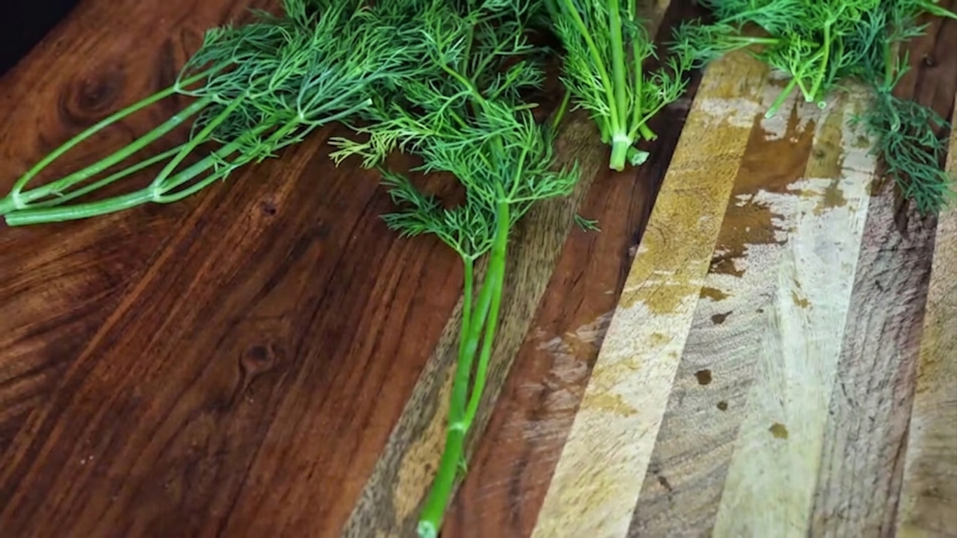 Fresh dill leaves roughly chopped with thick tough stems trimmed and discarded