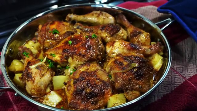 Freshly chopped green parsley and sliced scallions sprinkled over hot baked chicken