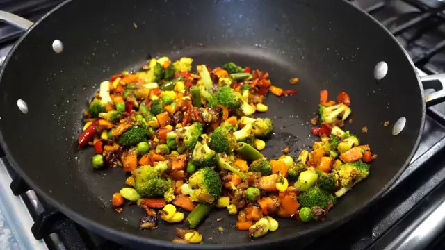 Cold cooked rice gently folded and stir-fried with the spiced vegetables