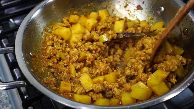 An extra spoonful of ghee added to the chicken keema for rich flavor and sheen