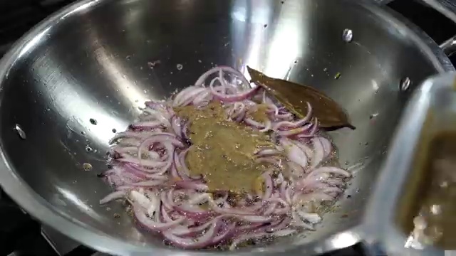 Garlic, ginger, cumin, and black peppercorns ground coarsely without water in blender