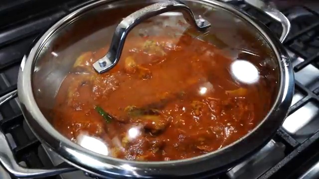 Heavy cream poured into the butter chicken gravy to create a luxurious velvety finish