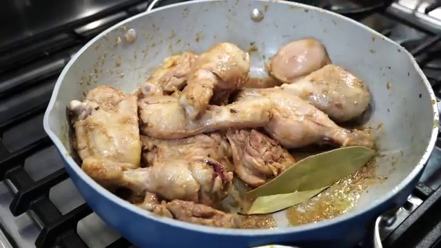 Hot water poured into the skillet to create a rich, savory Xacuti curry gravy