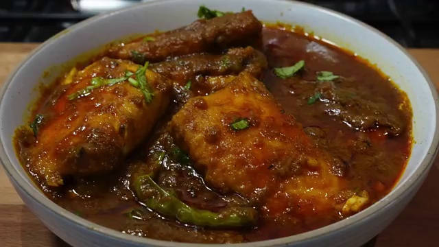 Leftover Bengali fish curry stored safely in an airtight container