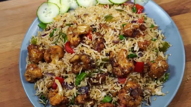 Leftover Cauliflower Manchurian fried rice packed in an airtight container for meal prep