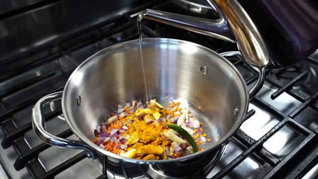 Masoor dal softening and breaking down into a creamy consistency during cooking