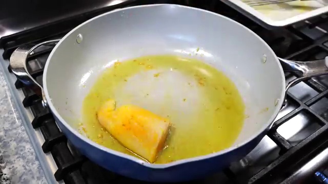 Smooth onion, ginger, and garlic paste poured into the golden sliced onions