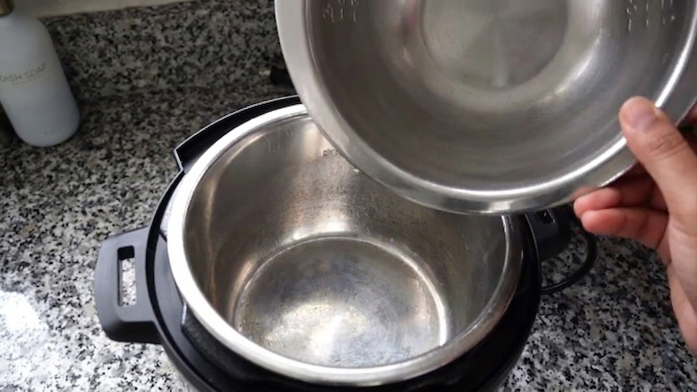 Aromatic Bengali panch phoron five-spice seeds crackling in hot cooking oil in a pan