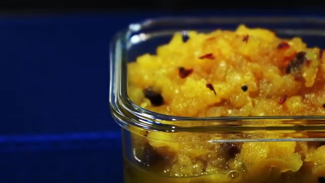 Pineapple chutney served alongside rice and a savory Indian meal