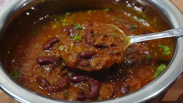 Leftover Bengali rajma curry stored safely in an airtight container for meal prep