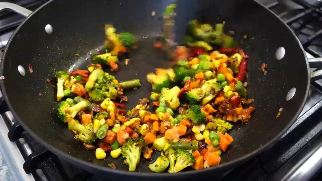 Sea salt and a pinch of sugar added to season the cooked vegetable mixture