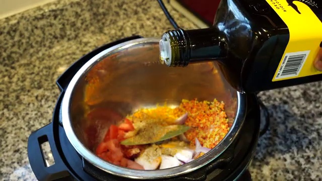 Cooked moong masoor dal simmering gently on the stovetop after adjusting consistency