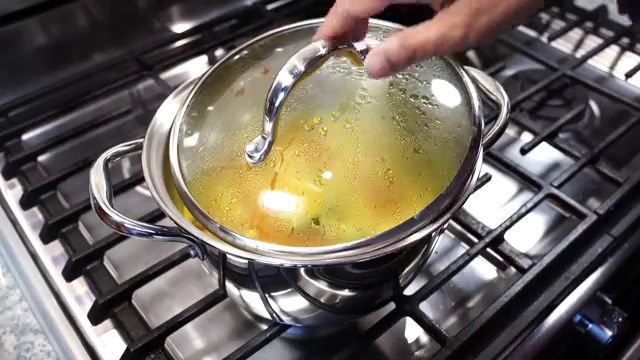 Smooth, silky, and tender cooked red lentils in the cooking pot