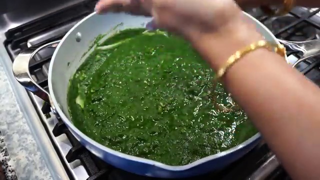 Silky vibrant green spinach puree poured directly into the sautéed onion base