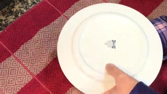 Smooth mango crème caramel pudding with golden caramel sauce on a serving plate