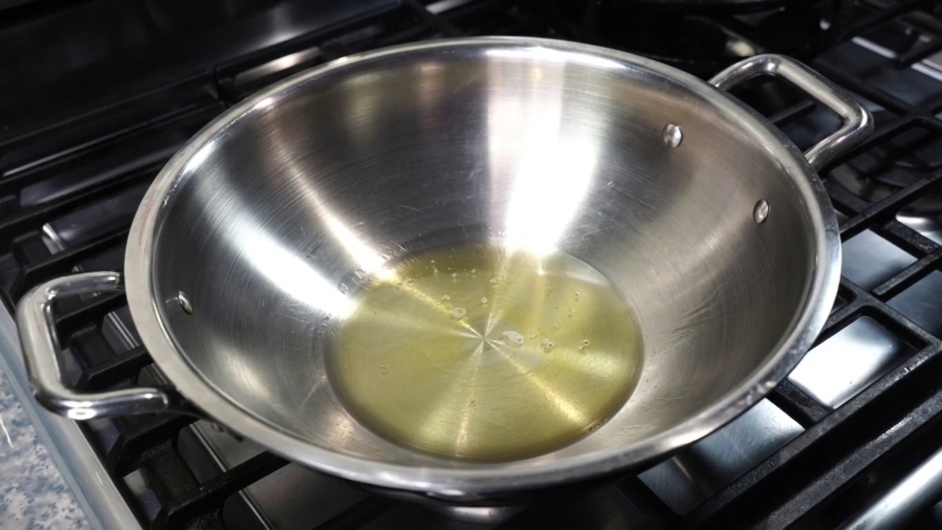 Smooth whisked plain yogurt in a mixing bowl ready for spices