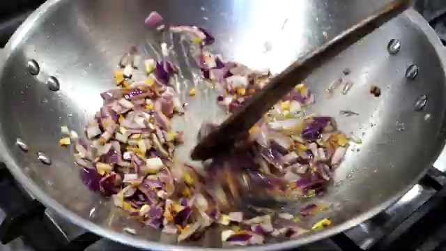 Dark soy sauce, tomato ketchup, and red chili sauce added to the garlic-butter base