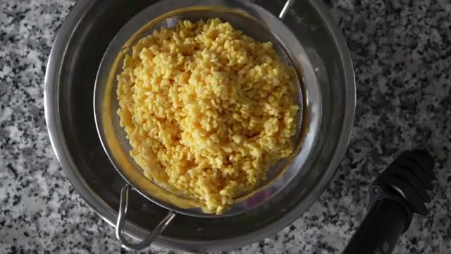 Split yellow moong dal soaked and ready to be blended for moonglet batter