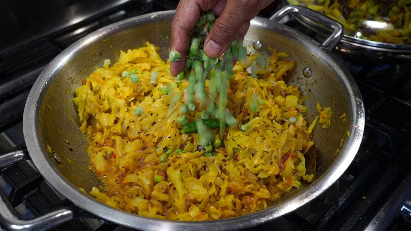 Freshly chopped green coriander leaves garnished over the finished cooked cabbage curry