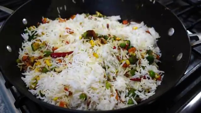 A pinch of freshly ground nutmeg sprinkled over the steaming vegetable rice