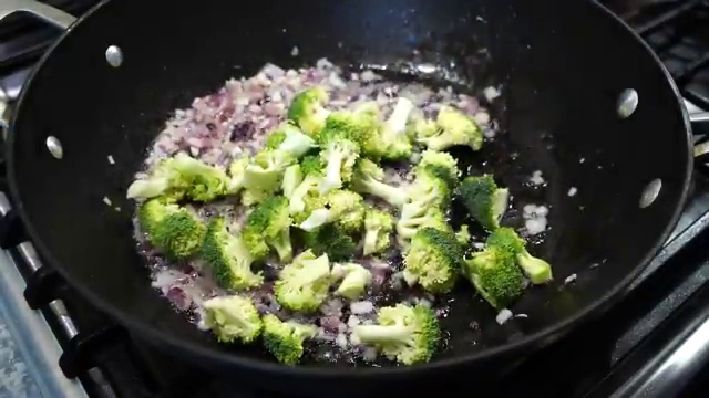 Broccoli florets stir-fried over high heat until vibrant bright green and crisp-tender