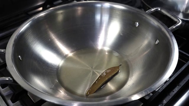 Tempered moong masoor dal stirred gently to swirl the fragrant spiced oil into the lentils