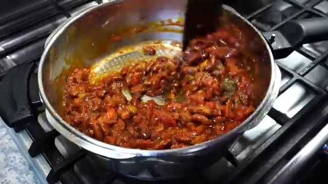 Tender, fully cooked red kidney beans inside the pressure cooker after cooking